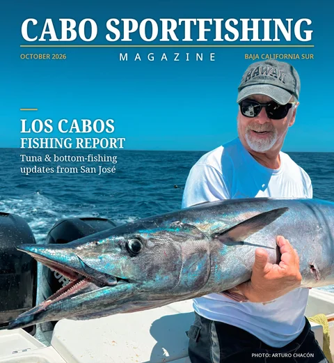 Magazine cover featuring an angler holding a large wahoo aboard a sportfishing boat off Los Cabos, October 2026